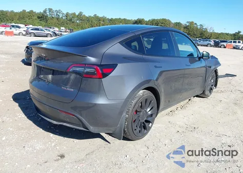 2023 Tesla Model Y Performance Dual Motor All-Wheel Drive z USA, uszkodzony, nr VIN 7SAYGDEFXPF942896